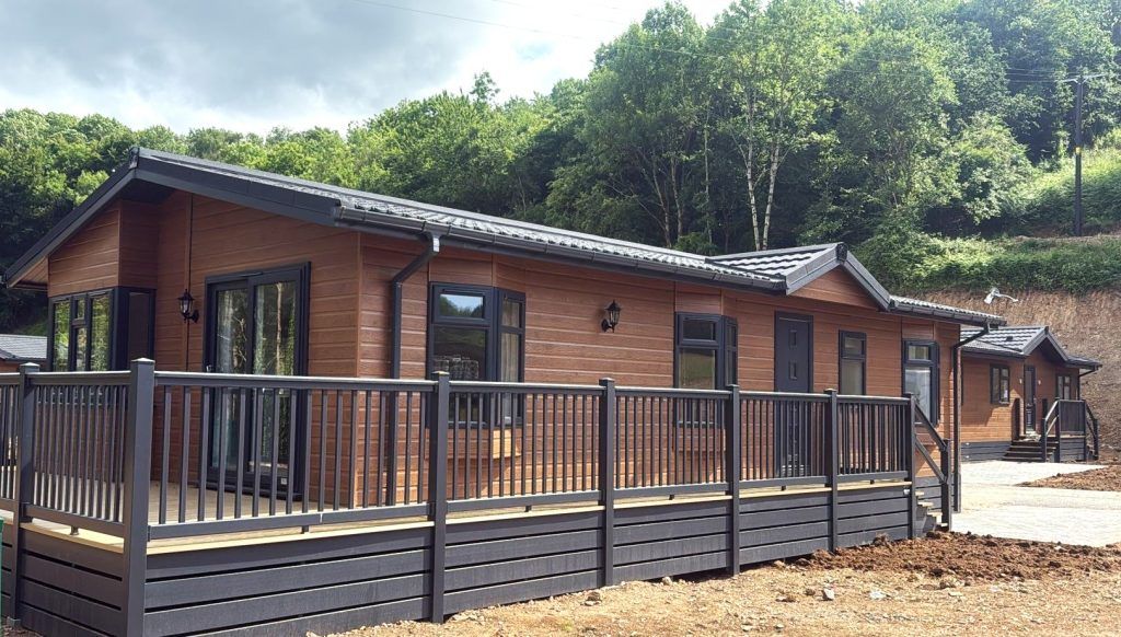 Property photo 3 of 14 Side Exterior View Of The Lodge With Spacious Decking