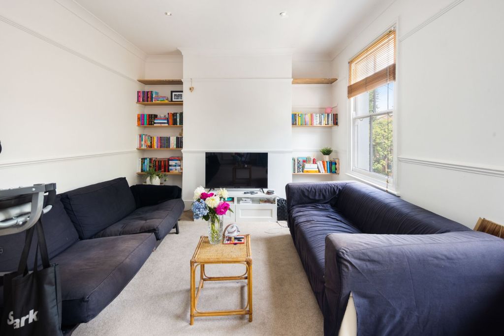 Property photo 2 of 15 Living Area