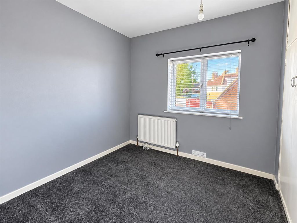 Property photo 2 of 18 Empty Modern Gray Bedroom With Window.Png