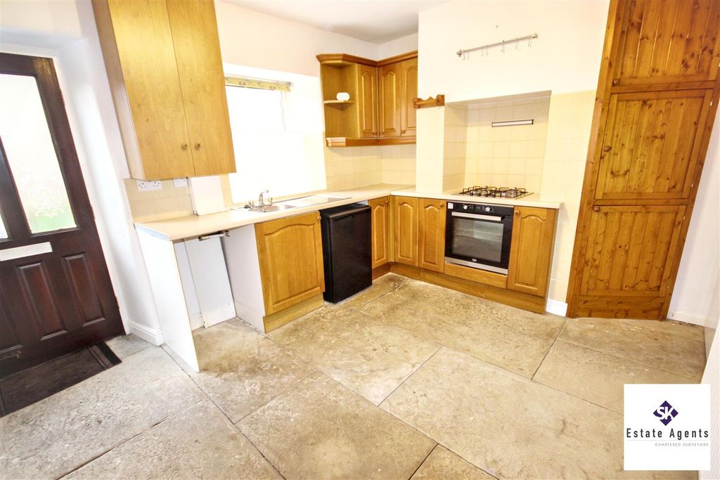 Property photo 3 of 11 Dining Kitchen