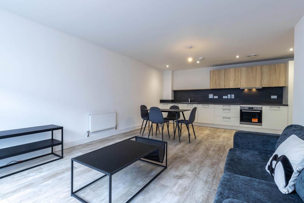 Property photo 2 of 13 Living Area