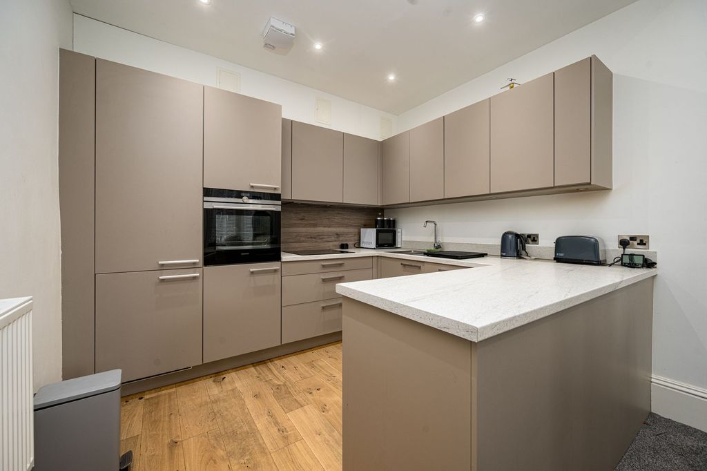 Property photo 3 of 18 Kitchen