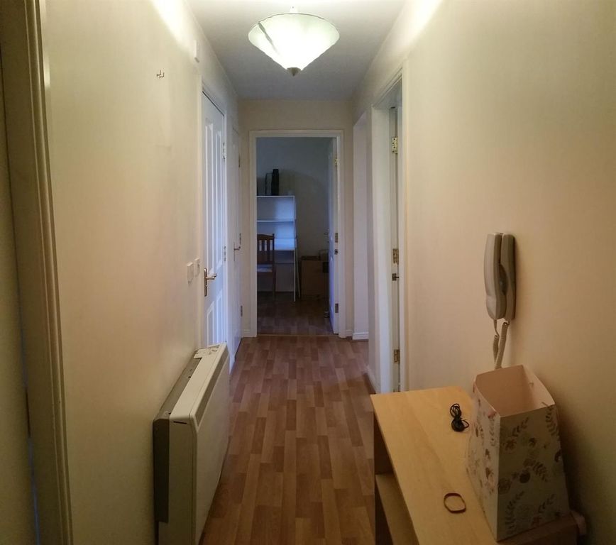 Property photo 3 of 15 Bright, Neutral Hallway With Wood-Effect Flooring,...