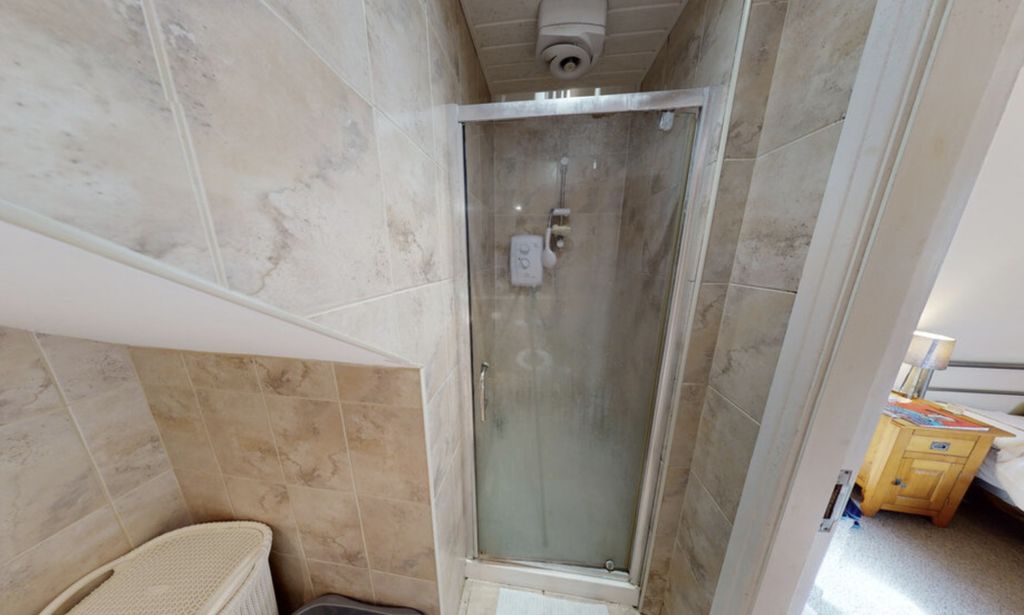 Property photo 2 of 7 A Clean And Modern Bathroom Featuring A Spacious S...