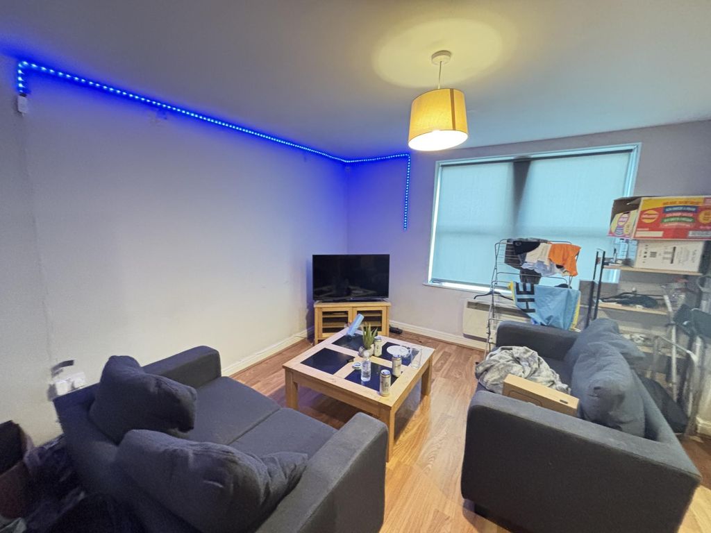 Property photo 1 of 4 A Modern And Cozy Living Room With Comfortable Sea...