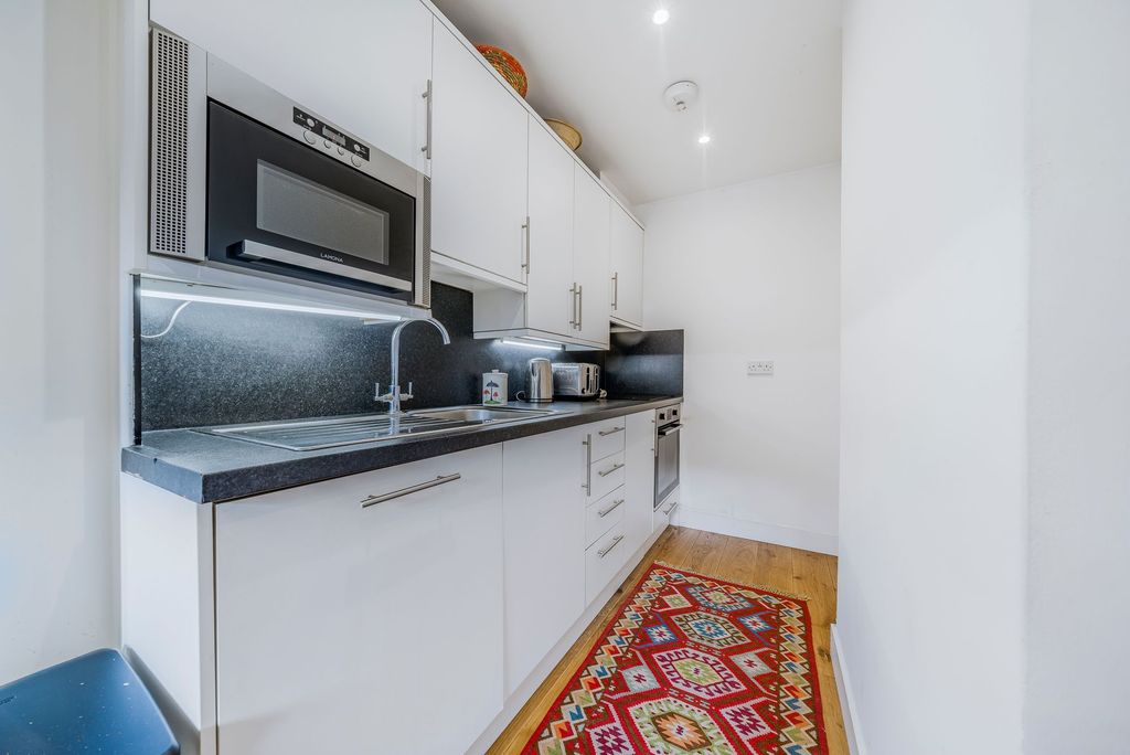 Property photo 3 of 16 Kitchen