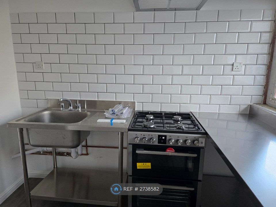 Property photo 2 of 9 Kitchen