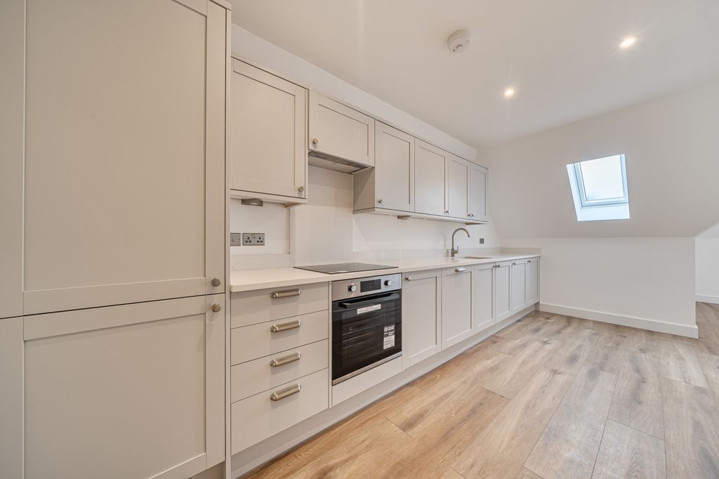Property photo 3 of 12 Kitchen