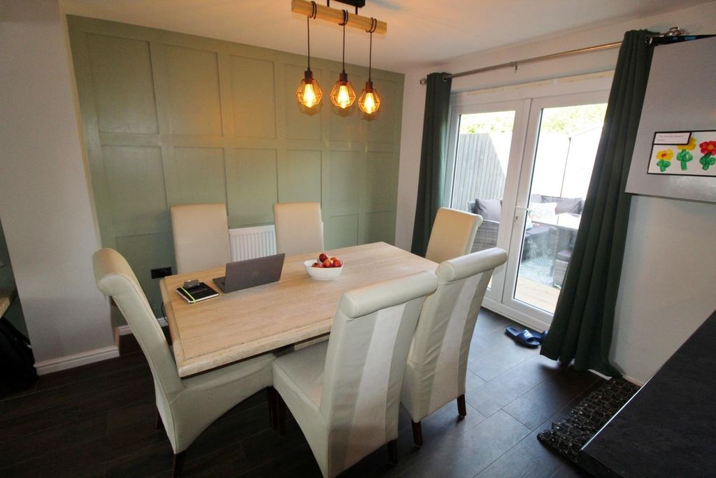 Property photo 3 of 13 Dining Kitchen