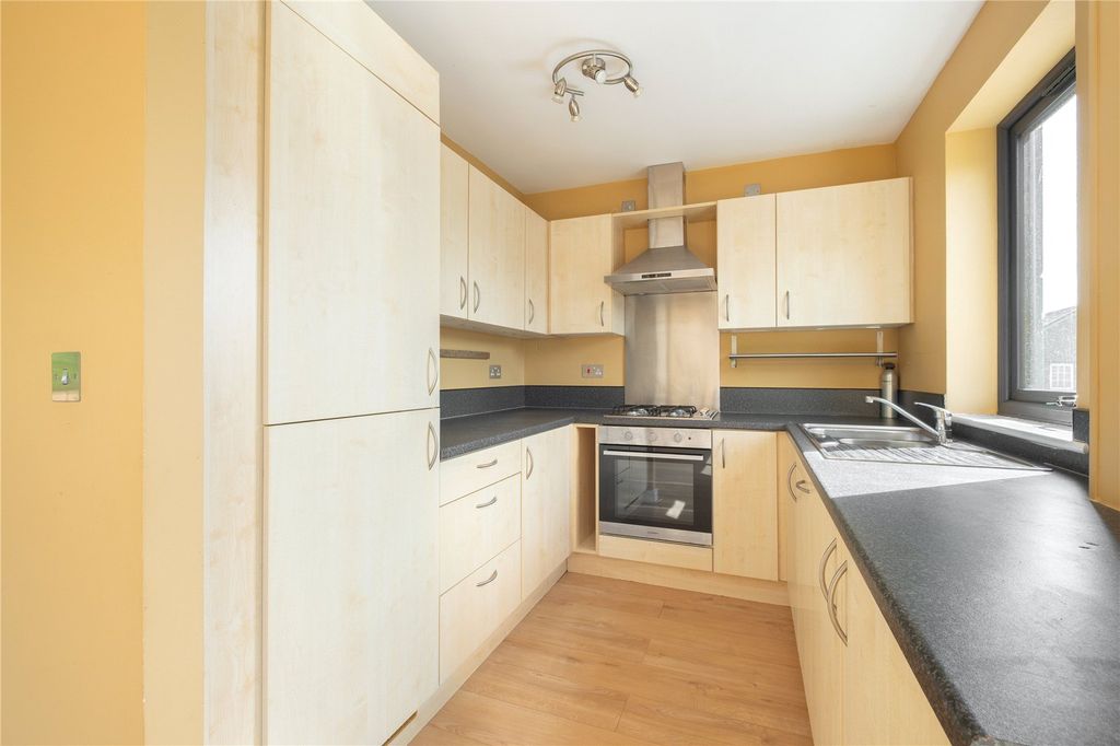 Property photo 3 of 28 Kitchen Area