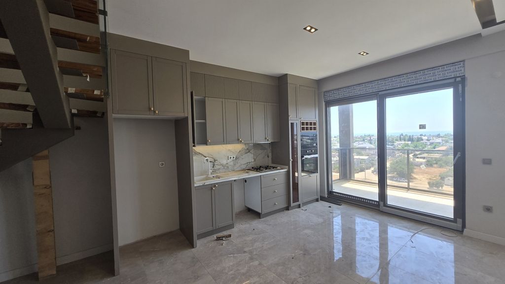 Property photo 2 of 13 Antalya Residence Apartments In Altintas For Sale - Open-Plan Fitted Kitchen