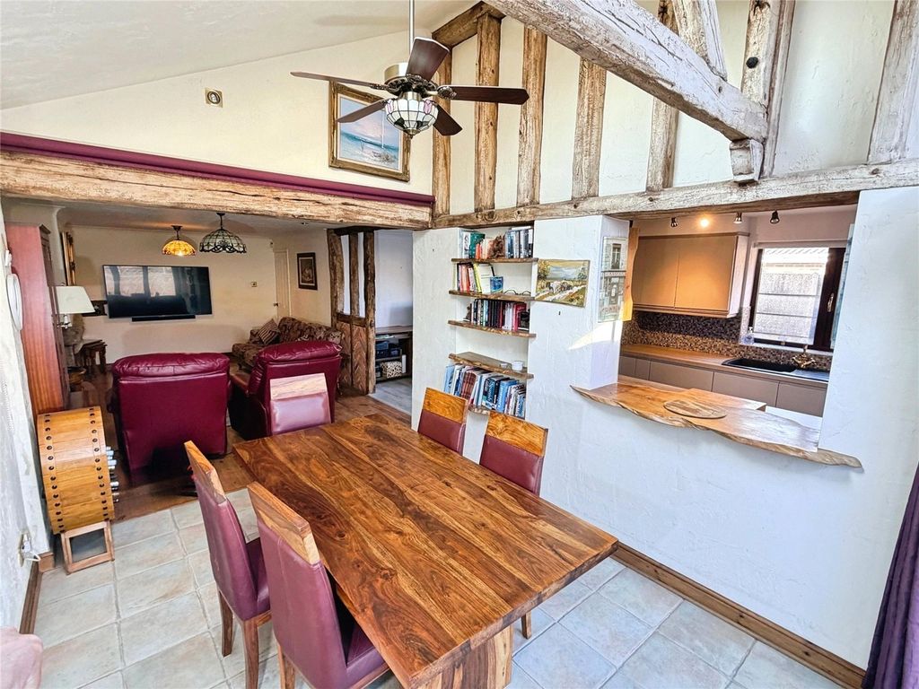 Property photo 3 of 22 Vaulted Dining Area