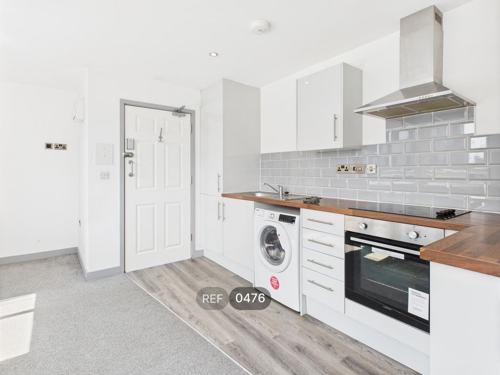 Property photo 2 of 12 Kitchen & Living Area