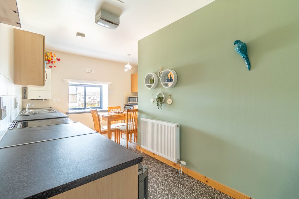 Property photo 3 of 15 Dining Kitchen