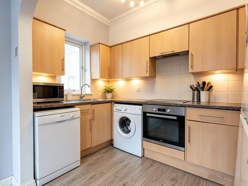 Property photo 3 of 13 Kitchen