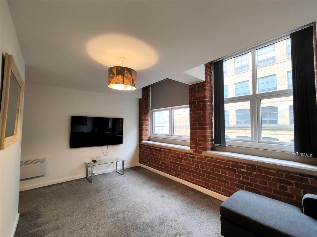 Property photo 2 of 8 Living Room Angle Two