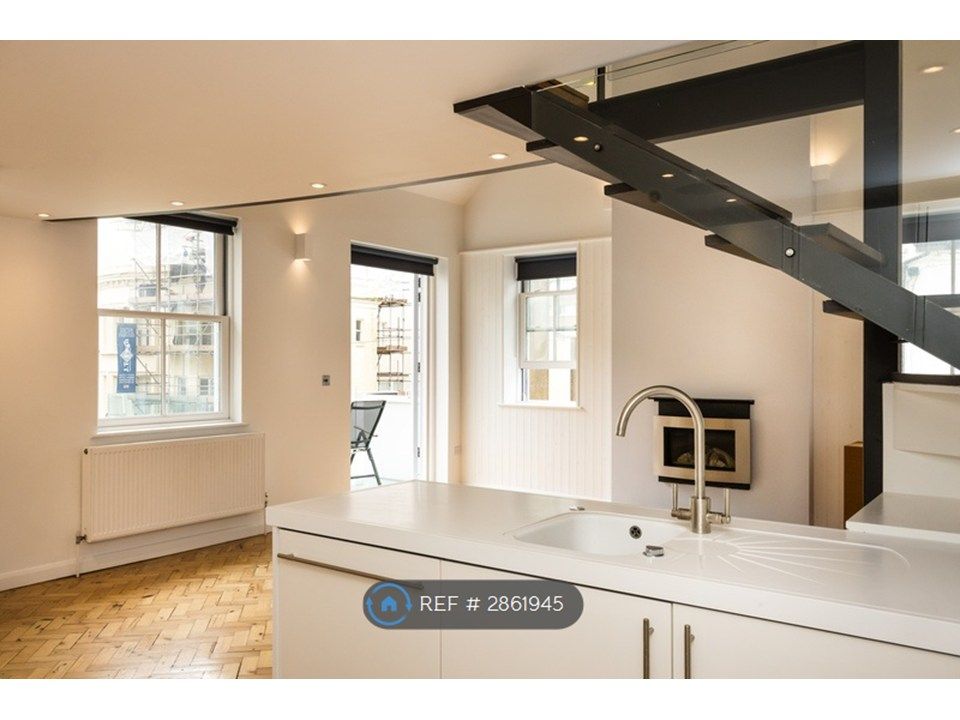 Property photo 3 of 22 Kitchen Looking Into Living Room