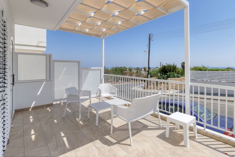 Property photo 2 of 19 Front Veranda With