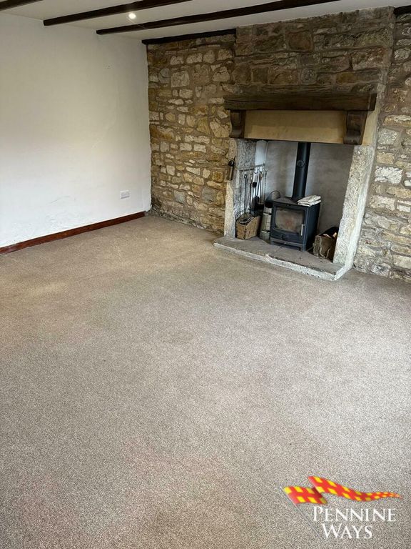 Property photo 3 of 12 Living Area