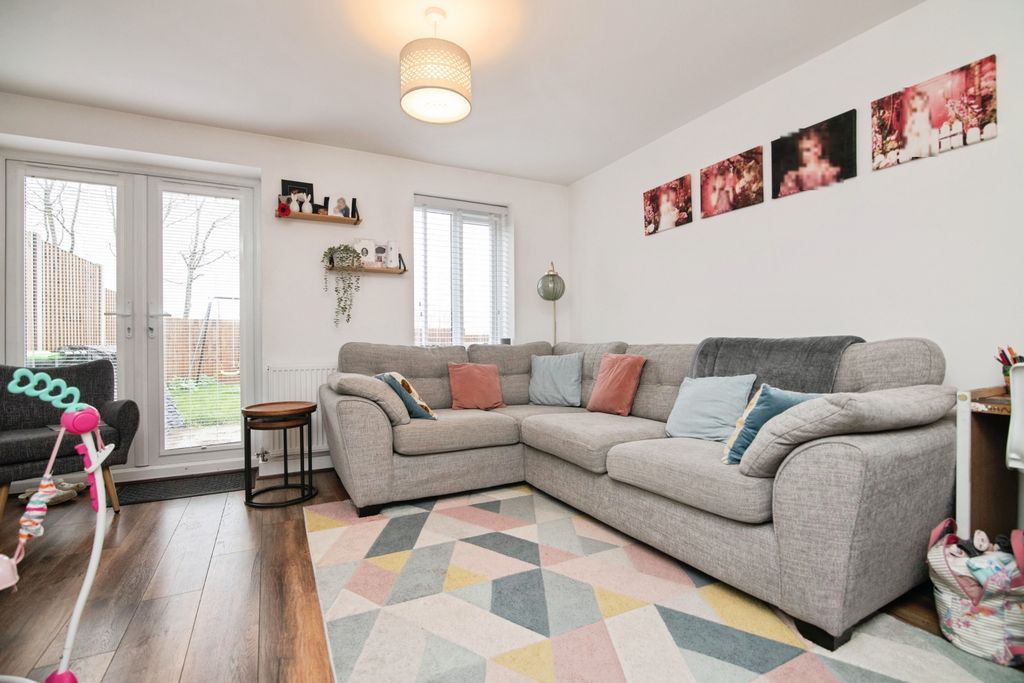 Property photo 2 of 9 Living Area