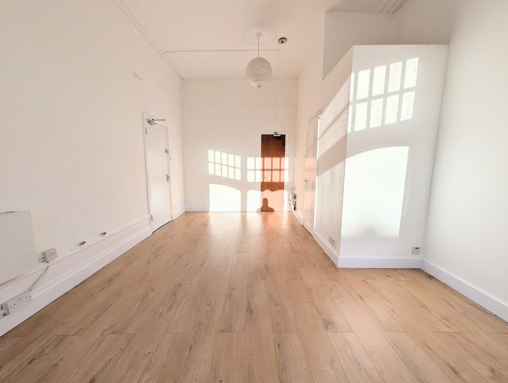 Property photo 3 of 8 Bedroom / Living Room