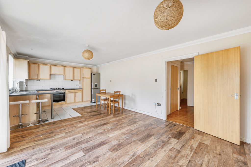 Property photo 1 of 12 Kitchen Living Room 1