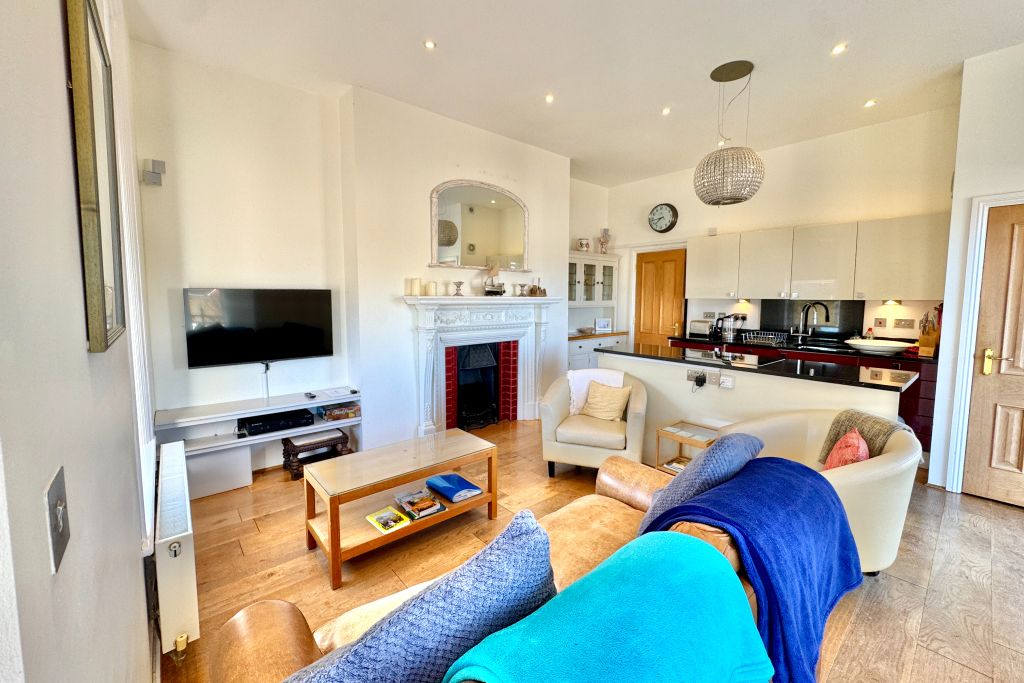 Property photo 3 of 12 Living Area