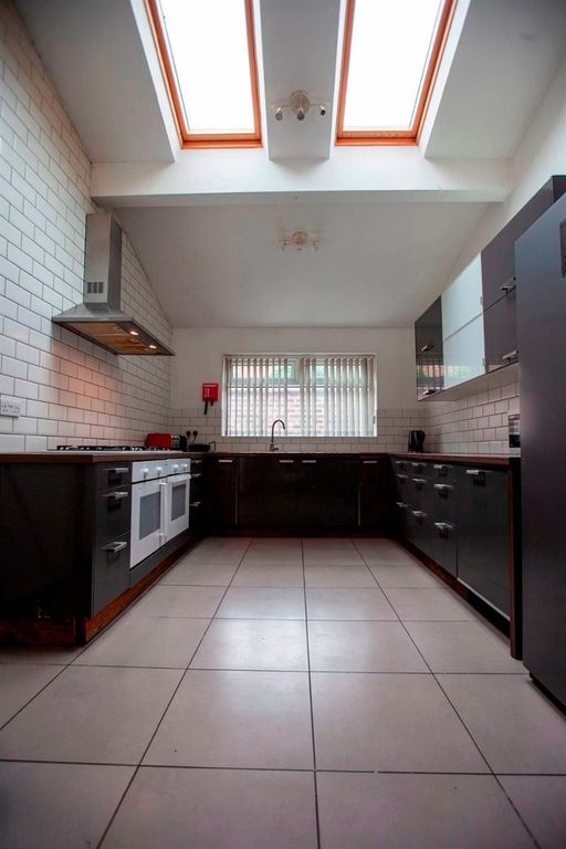 Property photo 2 of 10 Modern Kitchen With Skylights And Sleek Units...