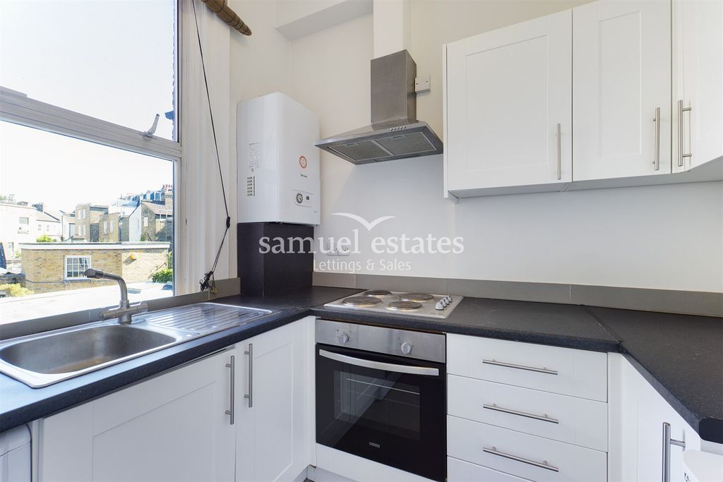 Property photo 3 of 7 Kitchen