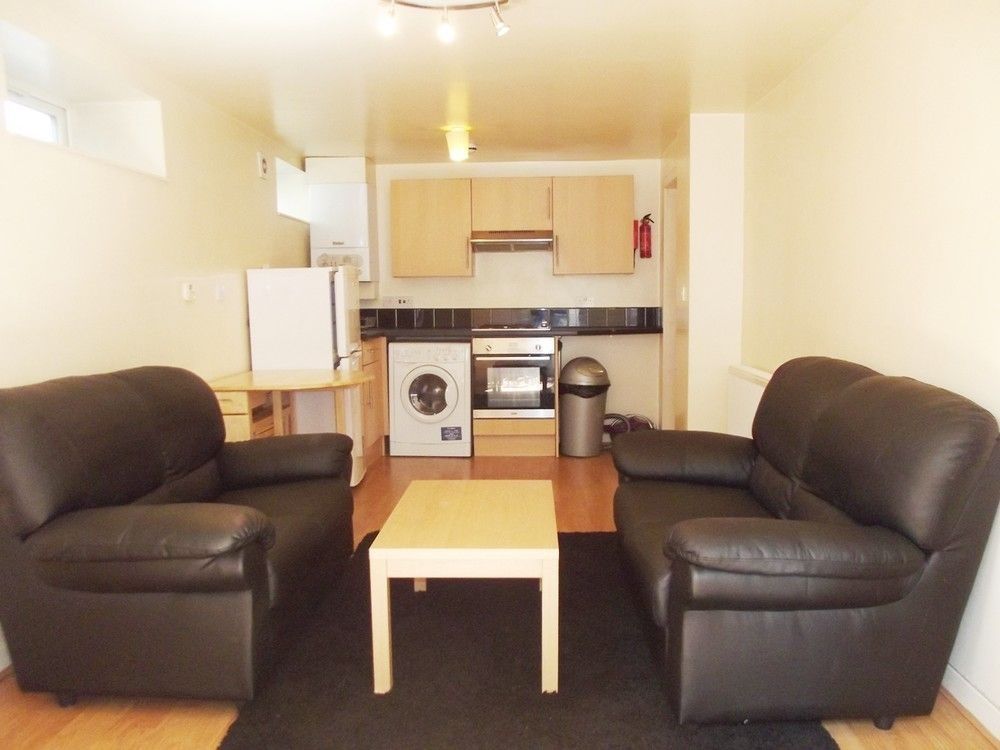 Property photo 1 of 8 Social Living Area With Comfy Sofas And Kitchen...