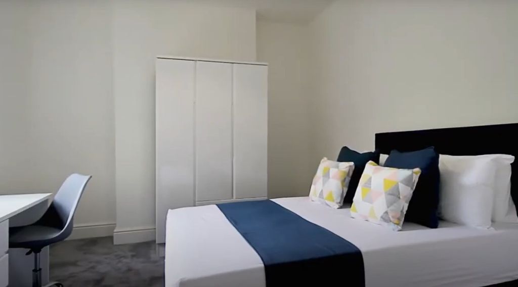 Property photo 1 of 8 Bright And Modern Master Bedroom Featuring A Comfo...