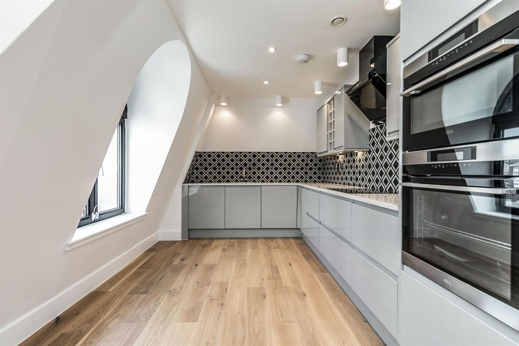 Property photo 1 of 12 Kitchen