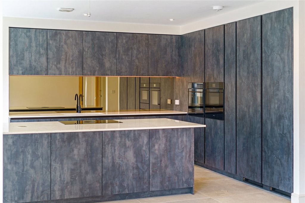 Property photo 3 of 17 Kitchen Area