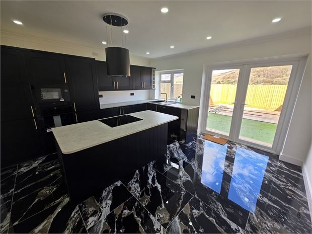 Property photo 2 of 12 Kitchen