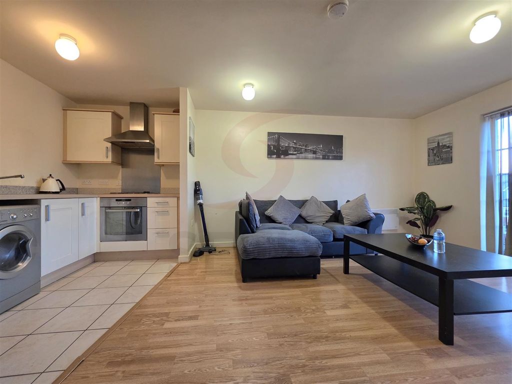 Property photo 2 of 9 Lounge/Kitchen Area