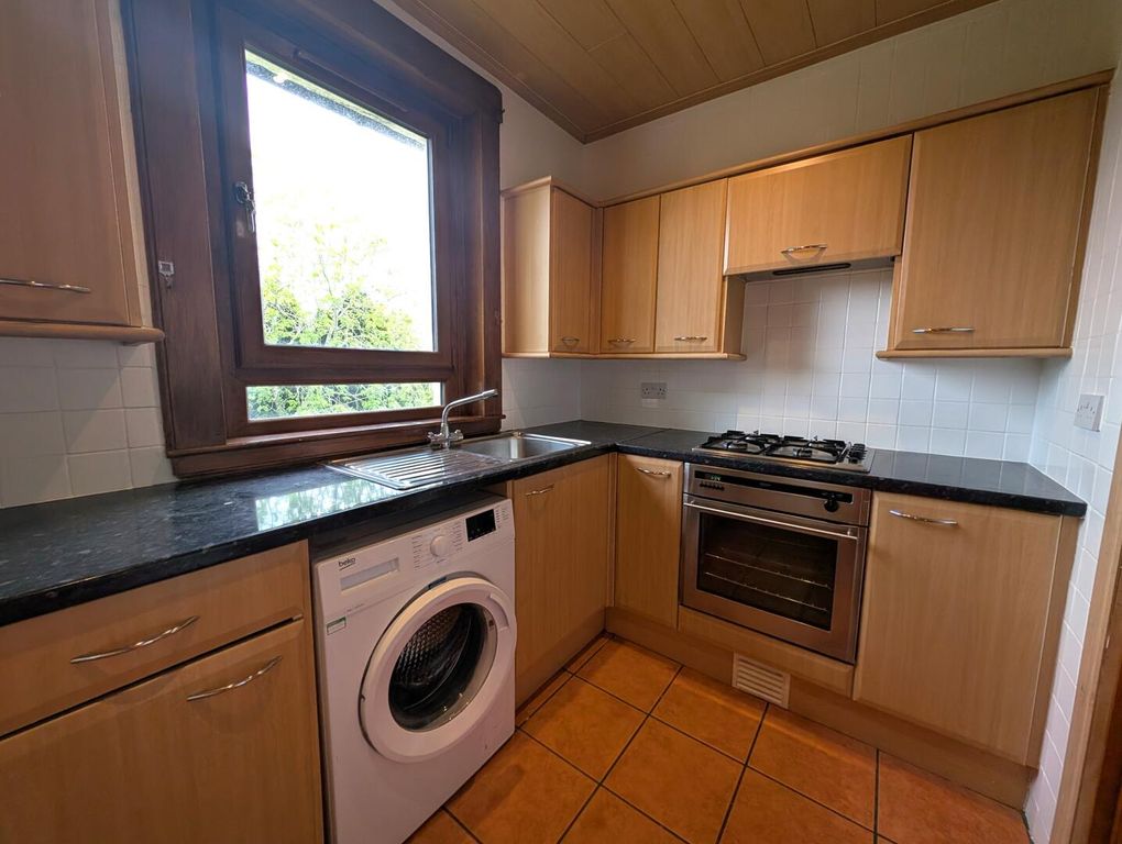 Property photo 3 of 9 Kitchen