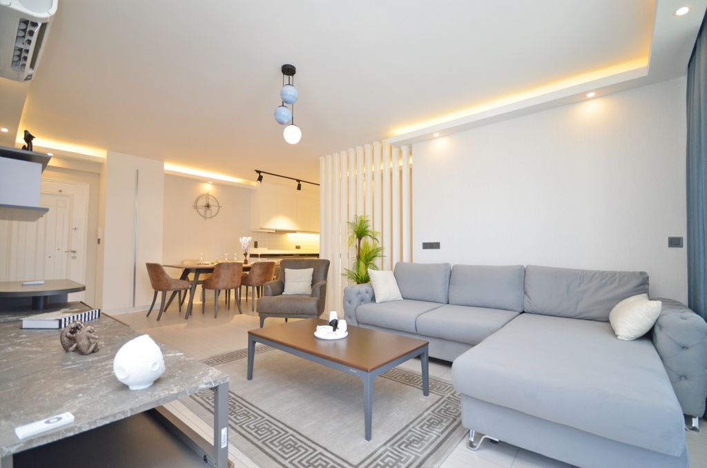 Property photo 3 of 25 Exceptional Apartment For Sale In Alanya - Lounge Through To The Dining Area