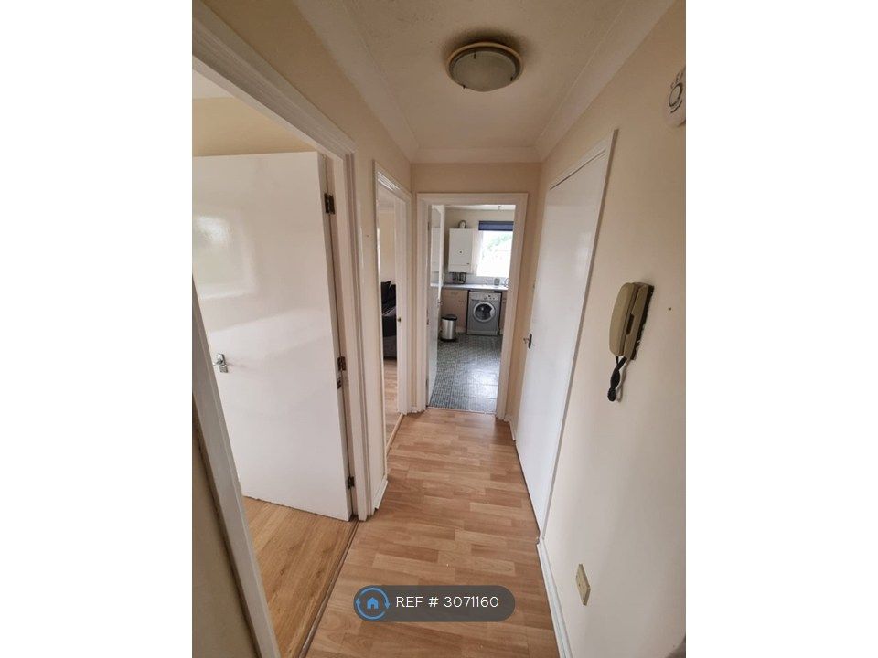 Property photo 3 of 15 Hallway - Doors Open