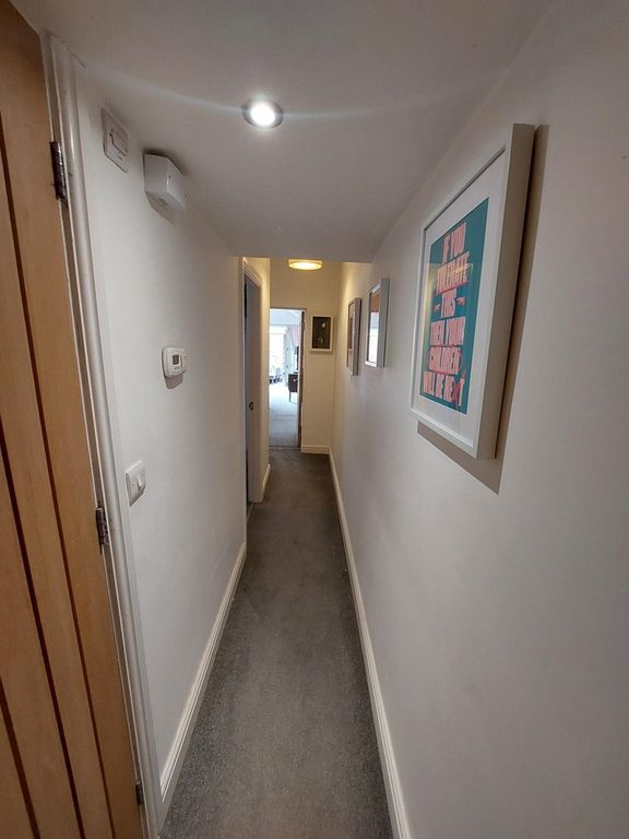 Property photo 3 of 8 Hallway