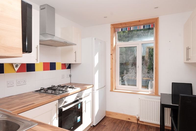 Property photo 3 of 13 Upstairs Kitchen