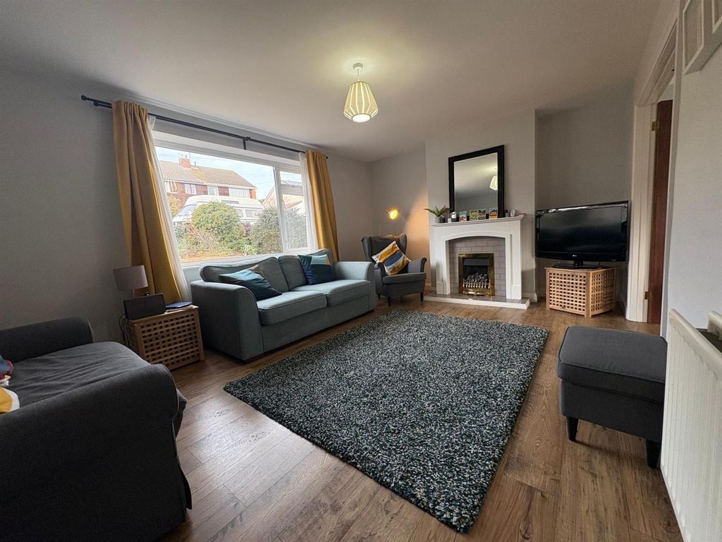 Property photo 3 of 11 Living Room.Jpeg