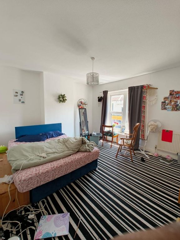 Property photo 2 of 13 Spacious Master Bedroom Featuring A Comfortable Do...