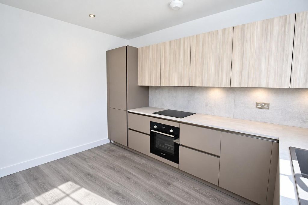 Property photo 2 of 21 Modern Minimalist Taupe Kitchen 1.Jpg