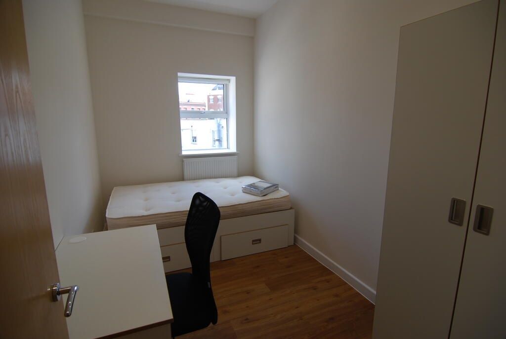 Property photo 2 of 2 Neat And Simple Single Bedroom Featuring A Functio...