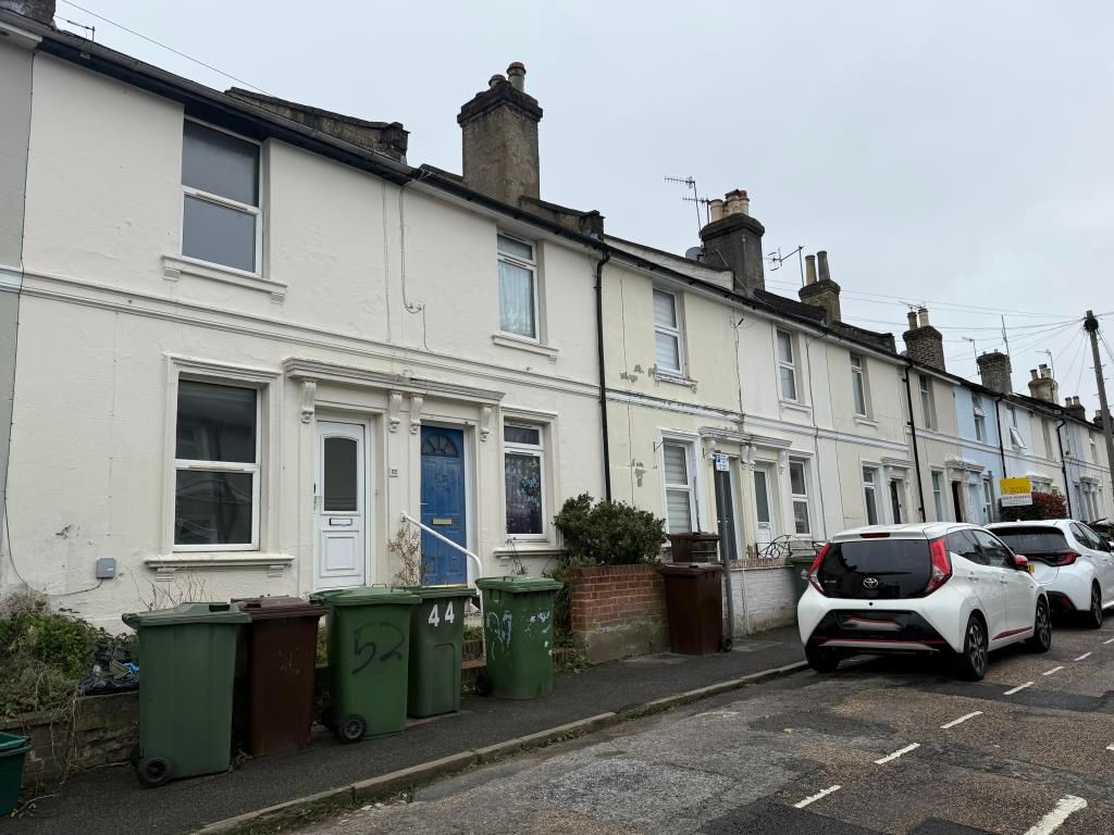 Property photo 2 of 8 Street View Of House In Need Of Improvement