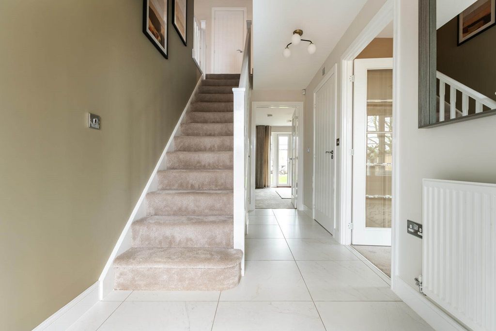 Property photo 3 of 12 The Marford Has A Bright And Spacious Hallway With Under Stairs Storage