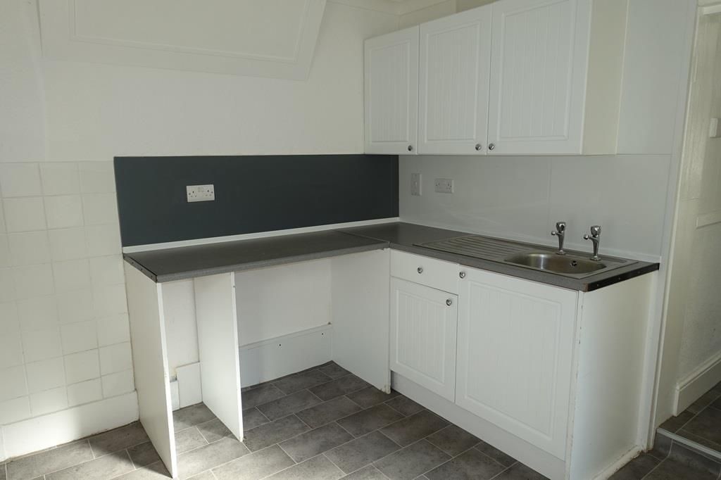 Property photo 3 of 12 Kitchen Area