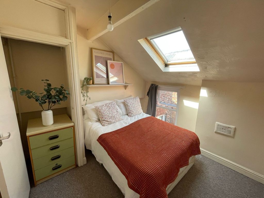 Property photo 1 of 19 Cozy And Inviting Bedroom With Natural Light Strea...