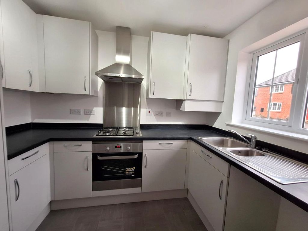 Property photo 2 of 17 Typical Kitchen