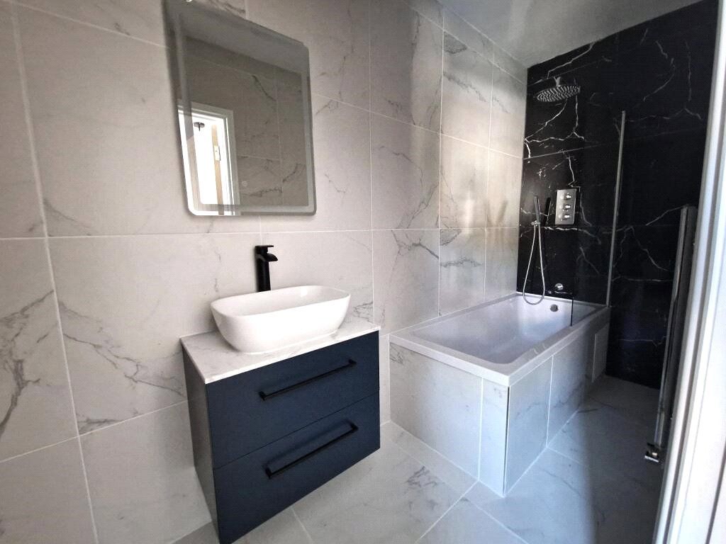 Property photo 3 of 8 Bathroom